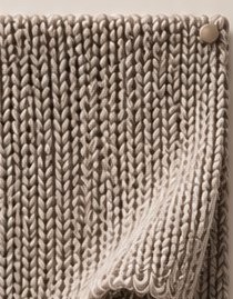 Knitted swatch with button
