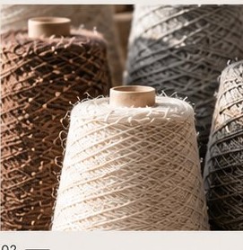 Yarn cones in warm light