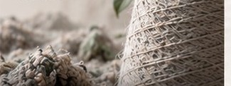 RE:FORM — yarn cone with dried plant